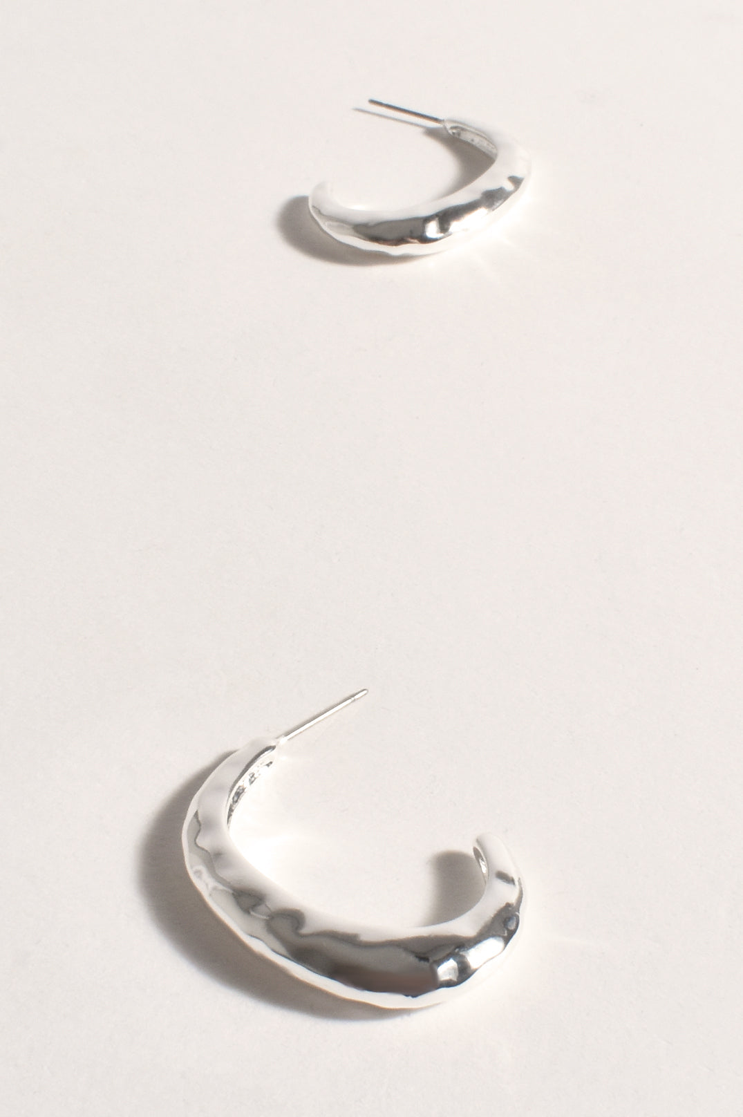 ADORNE MAX HAMMERED METAL HOOPS IN SILVER AED3741