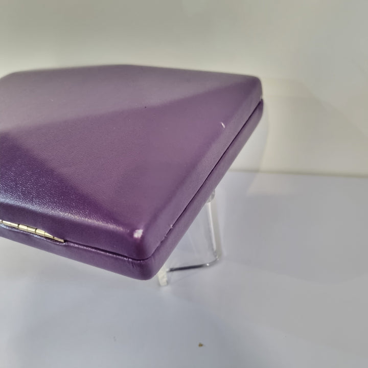 De Cavalier Purple Structured Clutch 854 has a small mark on corner