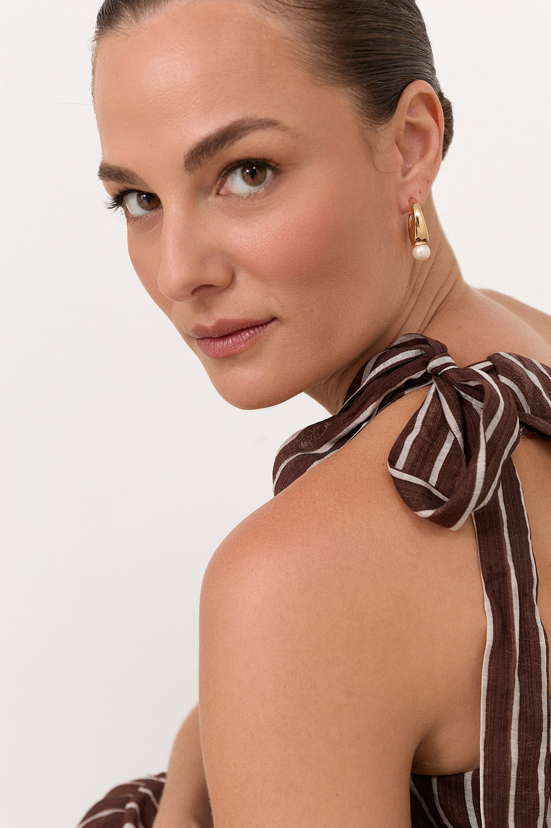 Adorne Pearl Drop Curved Front Earrings (Gold/Cream) (AED4280)