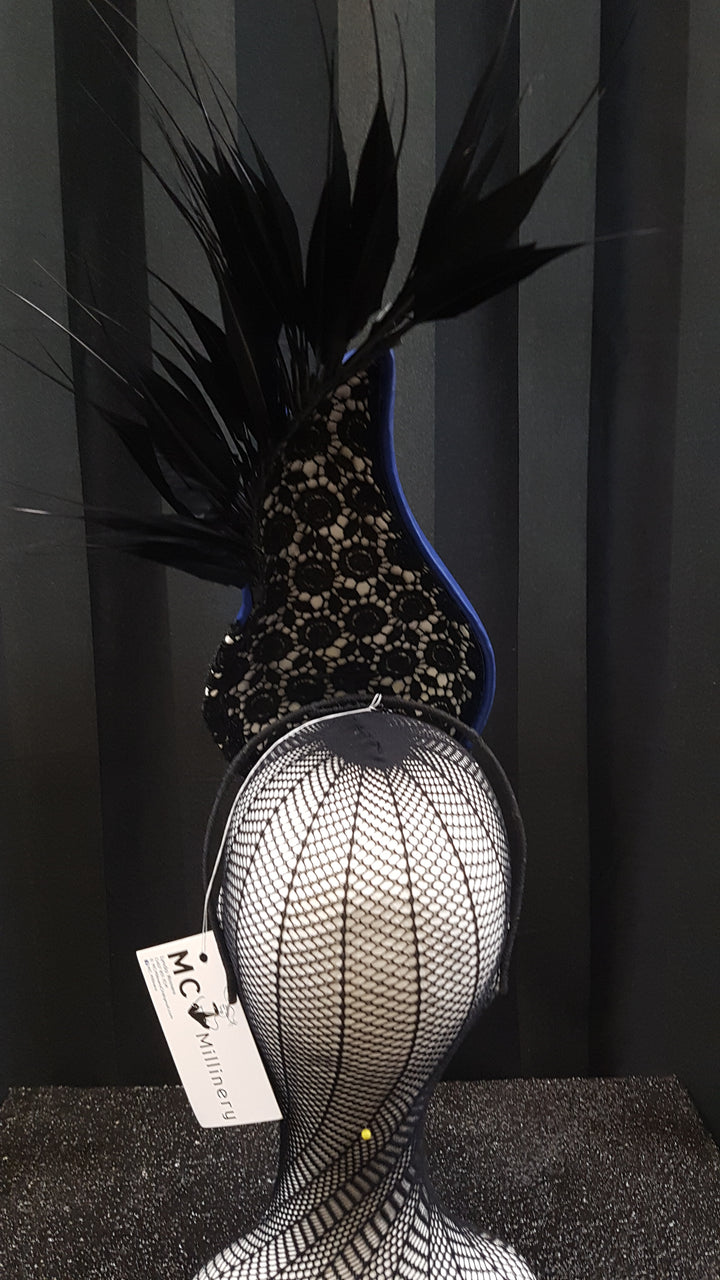 MC Millinery MC1207 Blue leather teardrop percher with lace and feather trim