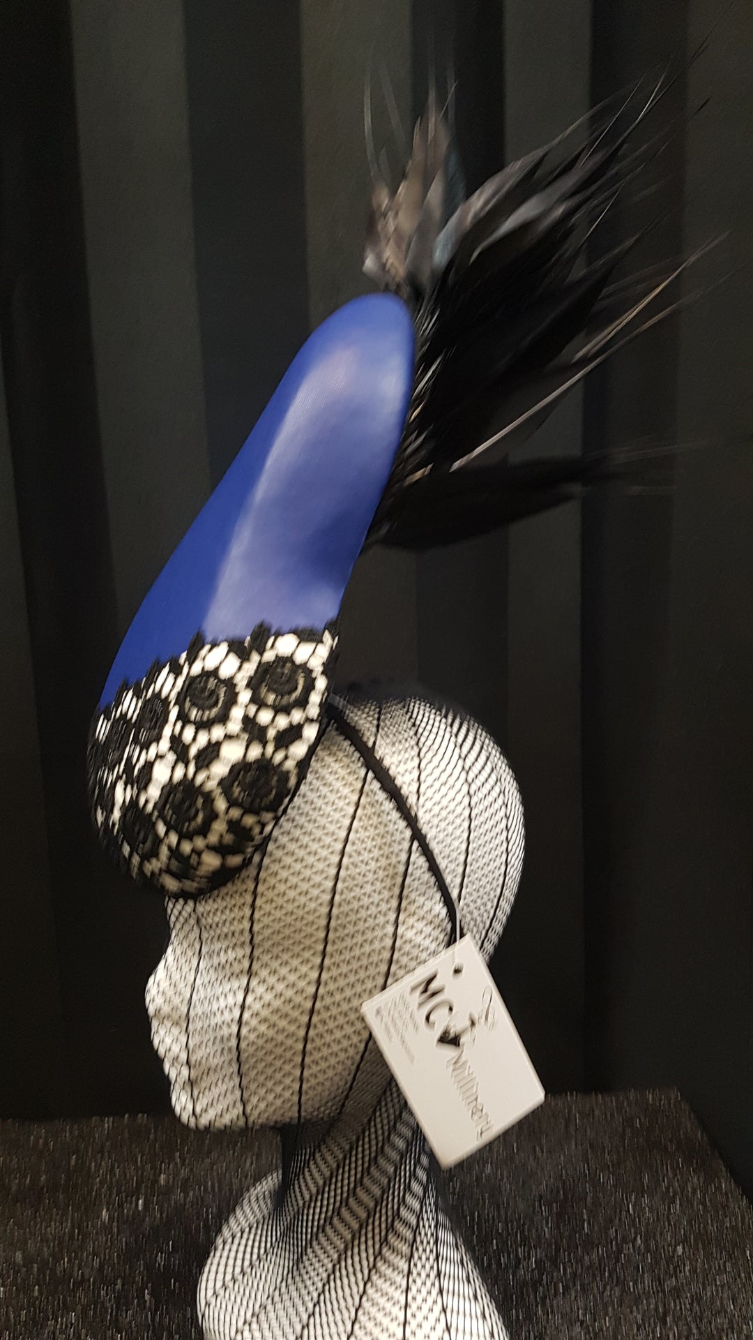 MC Millinery MC1207 Blue leather teardrop percher with lace and feather trim