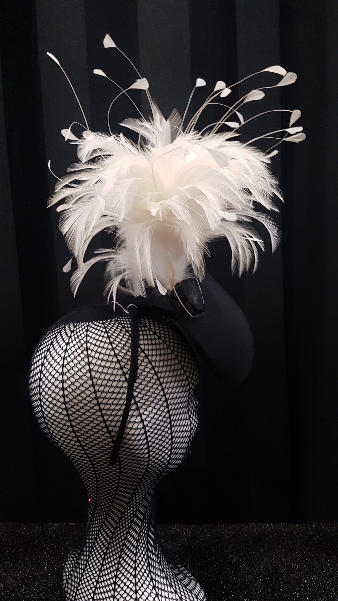 MC Millinery MC1208 Black fabric curved teardrop percher with feather tree