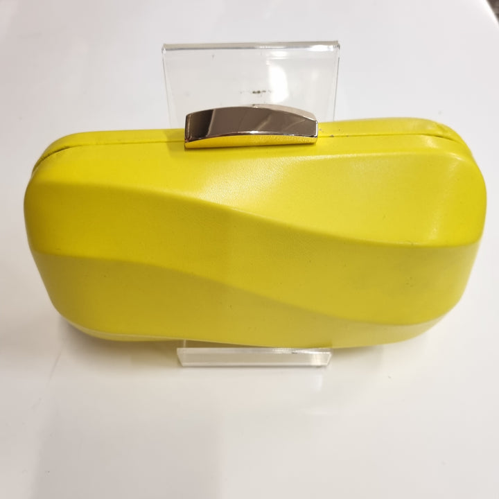 Avah Wave Clutch in Yellow has several marks J861