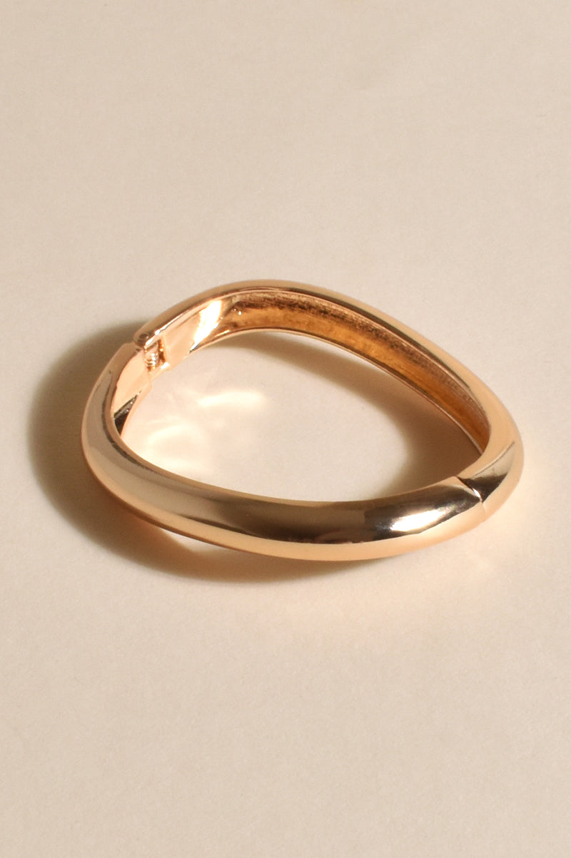 Wavy Hinged Metal Bangle in Gold ACD1520