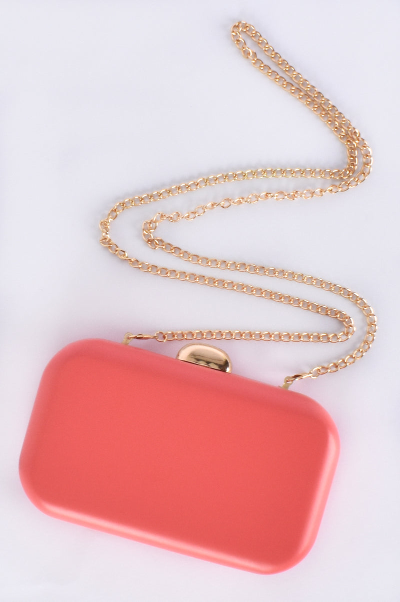 Adorne Celeste Sleek Structured Clutch in Coral 1518